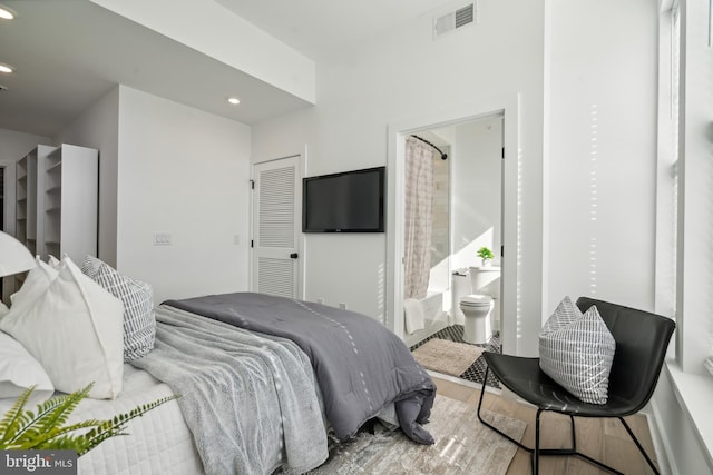 1513 Christian St Unit 5, Philadelphia, PA 19146 - bedroom with wood finished floors, recessed lighting, and ensuite bathroom