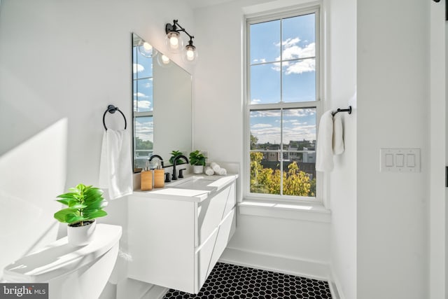 1513 Christian St Unit 5, Philadelphia, PA 19146 - bathroom with healthy amount of natural light, vanity, and tile patterned floors