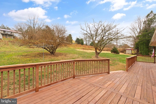 deck featuring a lawn