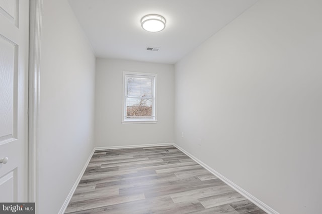 empty room featuring light hardwood / wood-style floors