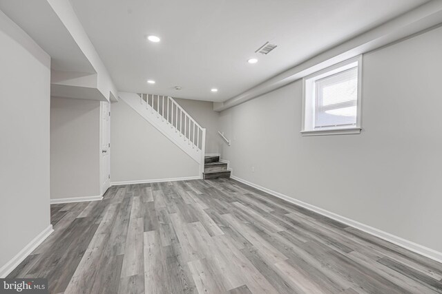 basement with light wood-type flooring