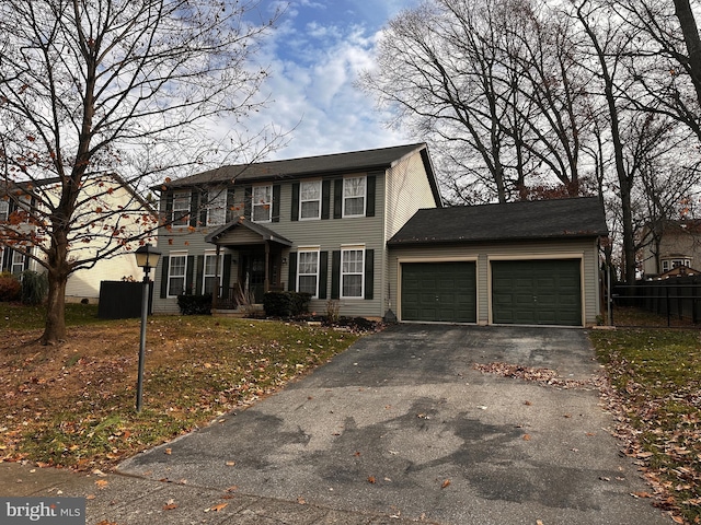 colonial-style house with a garage