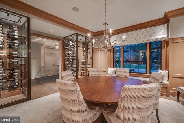 dining area with parquet floors and a notable chandelier