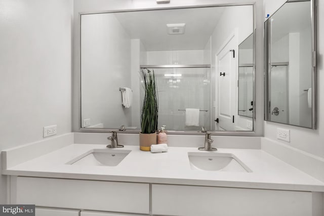 bathroom featuring vanity and walk in shower