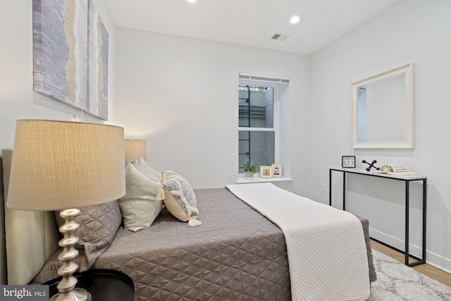 bedroom featuring light wood-type flooring