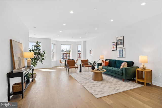 living room with light hardwood / wood-style floors