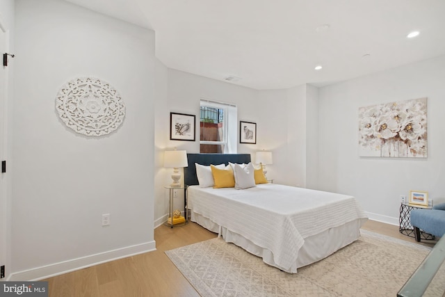 bedroom featuring wood-type flooring