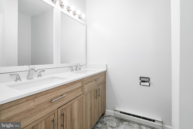167 Shamrock Dr, Salisbury, MD 21804 - bathroom with a baseboard radiator, marble look tiles, double vanity, and baseboards