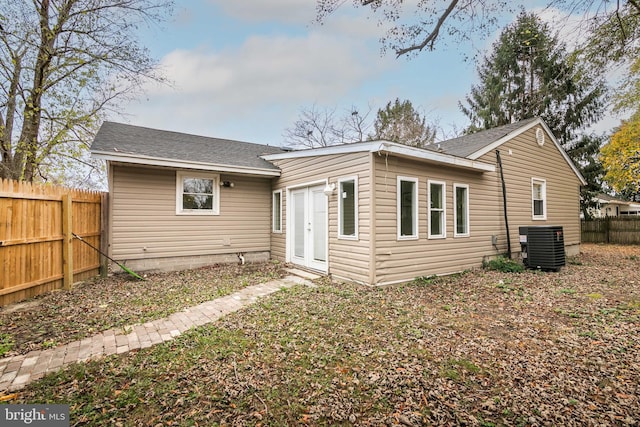 view of front of house featuring central air condition unit