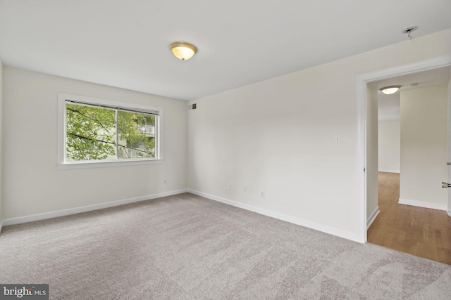 view of carpeted spare room