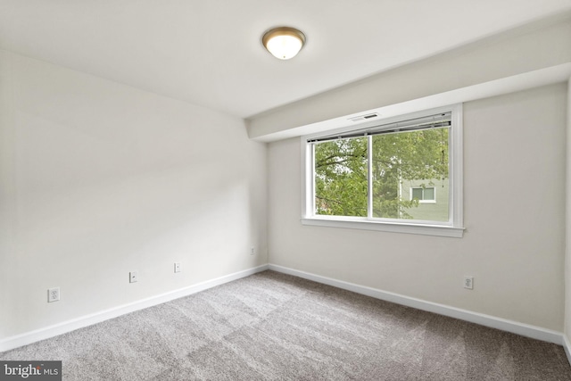 view of carpeted spare room