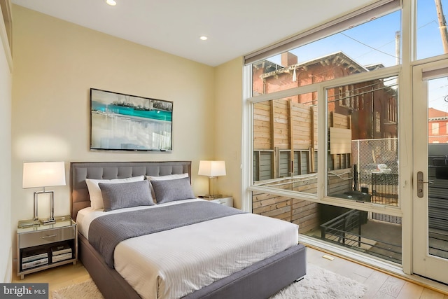 1510 N Capitol St NW Unit 102, Washington, DC 20002 - bedroom with wood finished floors, access to exterior, and recessed lighting