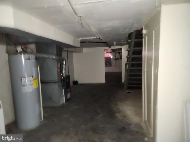 502 Brunswick St, Baltimore, MD 21223 - unfinished below grade area featuring water heater, stairway, and heating unit