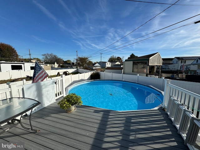 view of pool featuring a deck