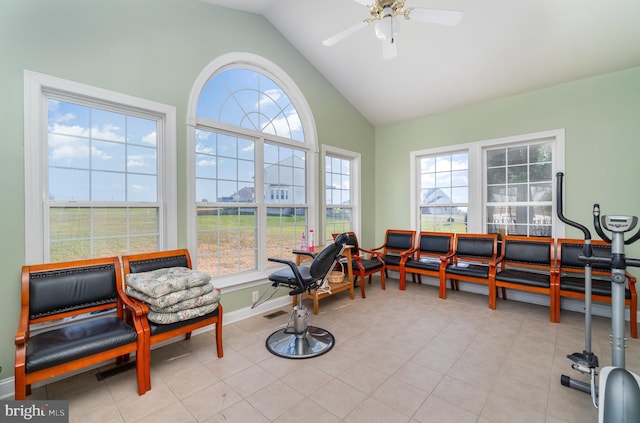 sunroom / solarium featuring ceiling fan and lofted ceiling