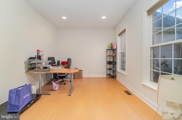 office with hardwood / wood-style floors