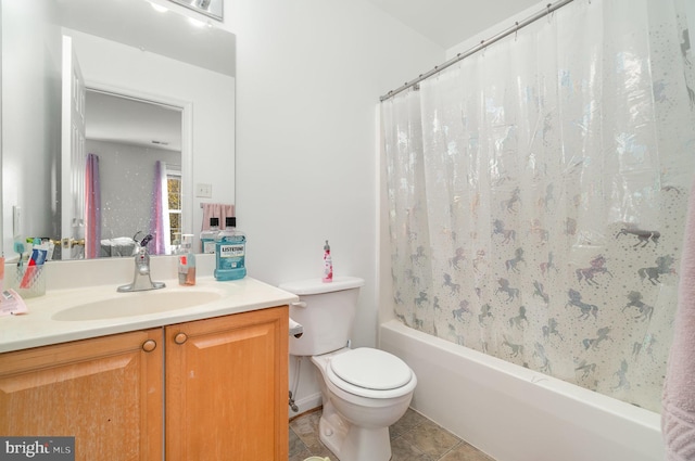 full bathroom featuring tile patterned flooring, vanity, toilet, and shower / tub combo