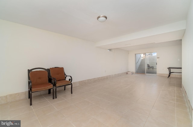 living area with light tile patterned floors