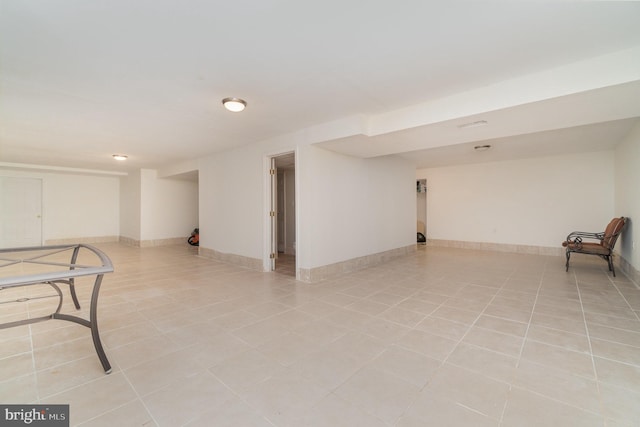 basement with light tile patterned floors