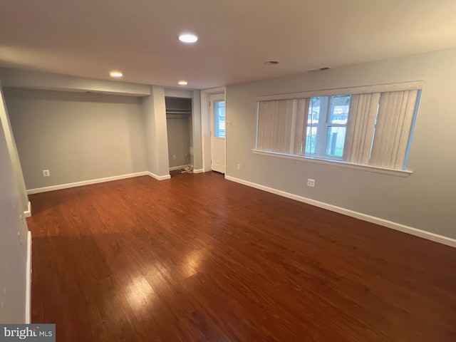 interior space with dark wood-type flooring