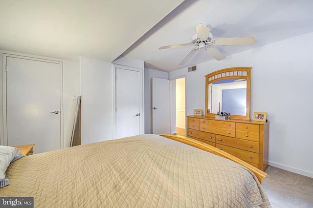 bedroom with ceiling fan and carpet floors