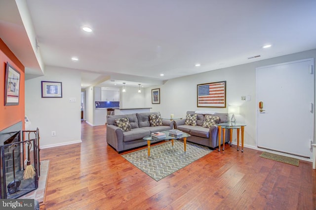 living room with hardwood / wood-style floors