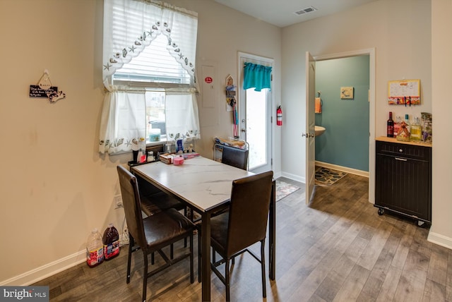 dining room featuring hardwood / wood-style flooring