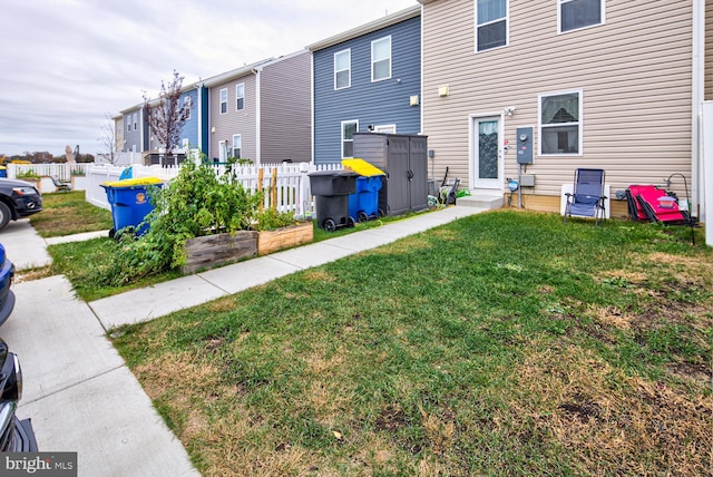 exterior space featuring a shed