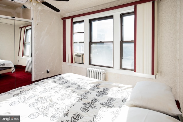 2217 N 59th St, Philadelphia, PA 19131 - bedroom with radiator, cooling unit, a ceiling fan, and a closet