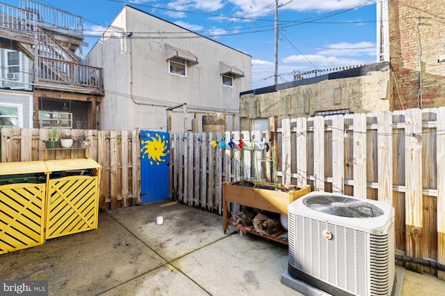 view of patio with cooling unit