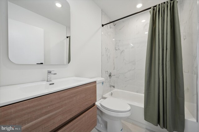 full bathroom with toilet, vanity, and shower / bathtub combination with curtain