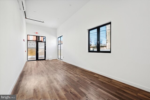 empty room featuring hardwood / wood-style floors