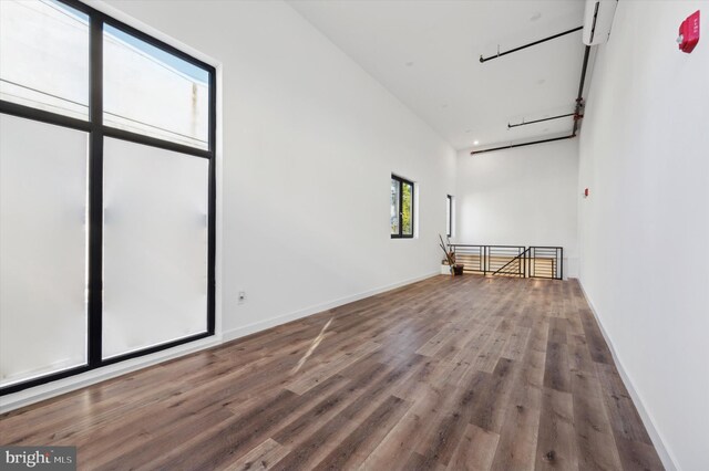 spare room with hardwood / wood-style flooring