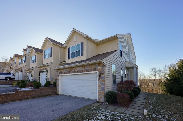 view of front of property with a garage