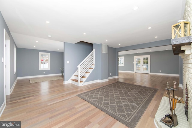 living room featuring hardwood / wood-style floors and french doors