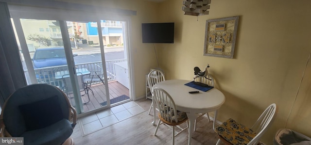 dining area with light hardwood / wood-style flooring