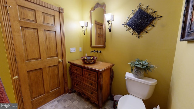 bathroom with sink and toilet