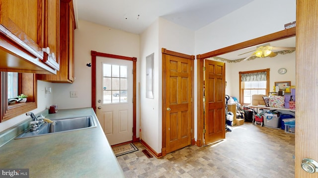 kitchen with sink and ceiling fan