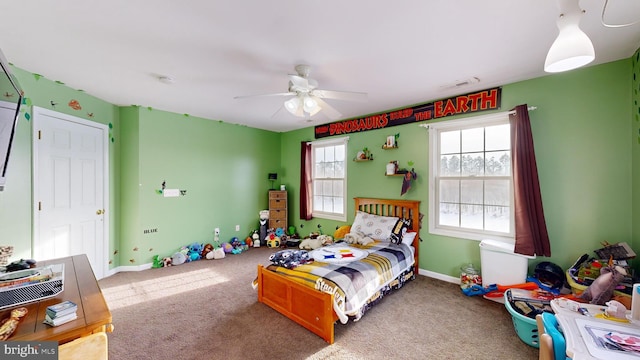 carpeted bedroom featuring ceiling fan