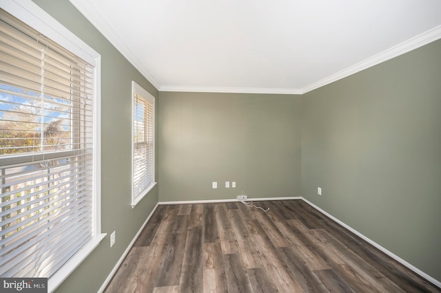 unfurnished room with dark hardwood / wood-style flooring and ornamental molding