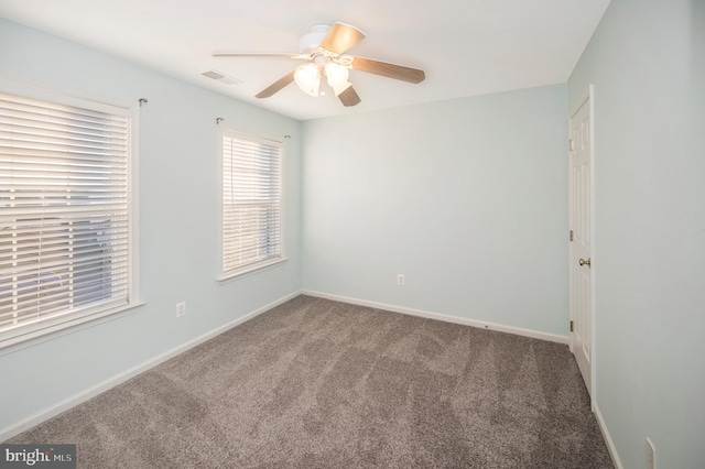 carpeted empty room with ceiling fan