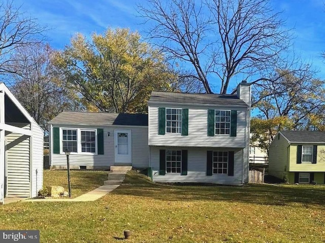 view of front of home featuring a front yard