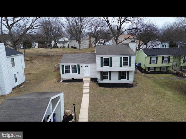 view of front of property featuring a front lawn