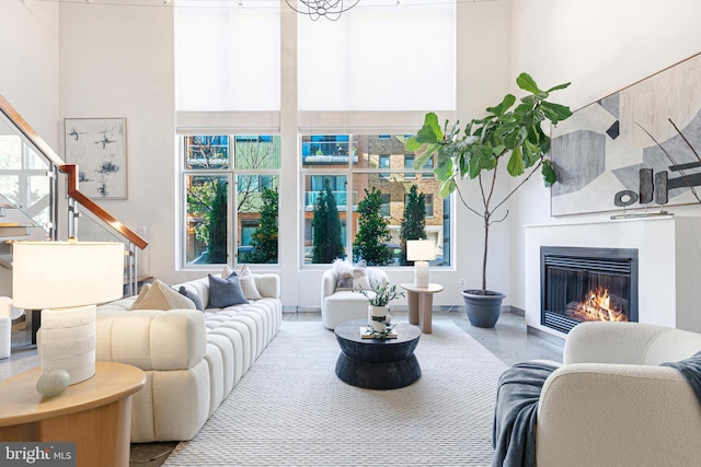 living room with a healthy amount of sunlight and concrete floors