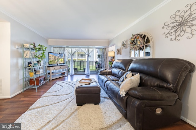 living room with ornamental molding and dark wood-type flooring