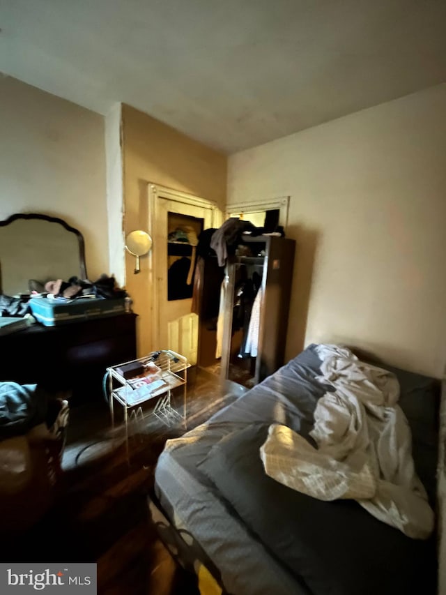 bedroom featuring wood-type flooring