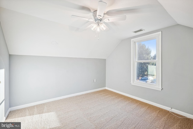 bonus room with ceiling fan, lofted ceiling, and carpet floors