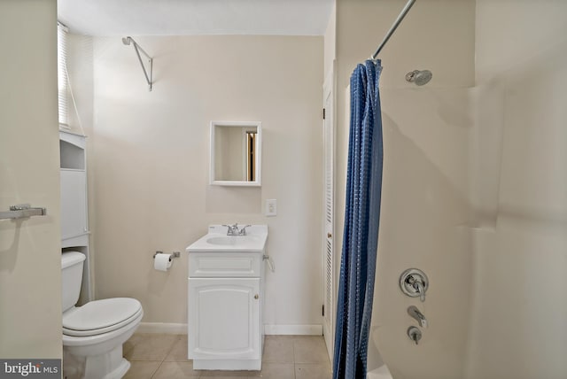 full bathroom with toilet, vanity, tile patterned floors, and shower / tub combo with curtain