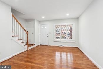 foyer featuring wood-type flooring