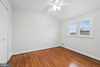 interior space with hardwood / wood-style floors and ceiling fan